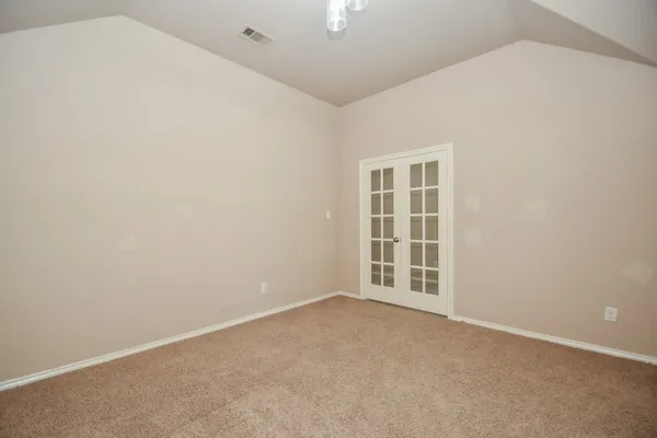 a view of empty room with a window