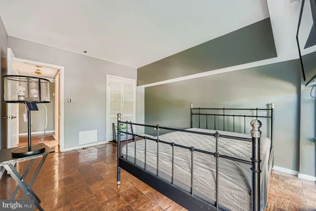 a view of staircase with white walls and a window