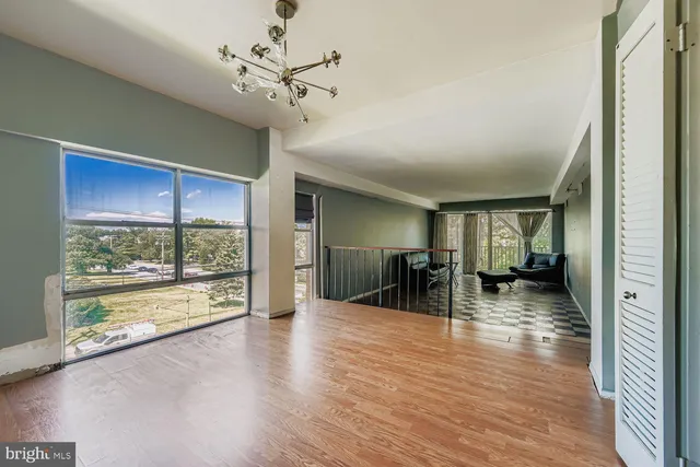 a view of a living room and a window