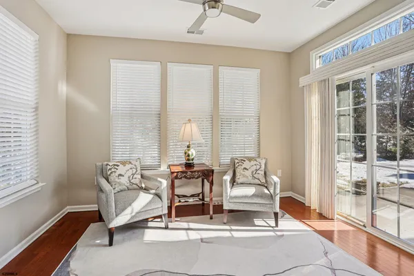 a view of house with a table and chairs