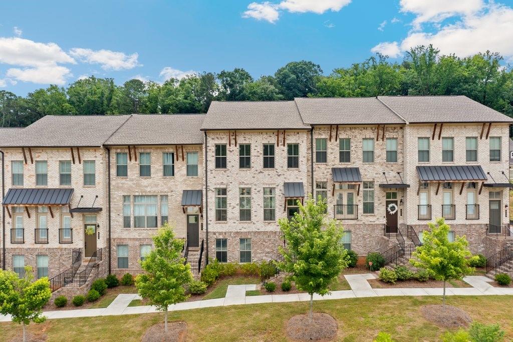 615 Harrington Hills Decatur, GA 30032 - Photo 1 of 1 a aerial view of a residential apartment building with a yard