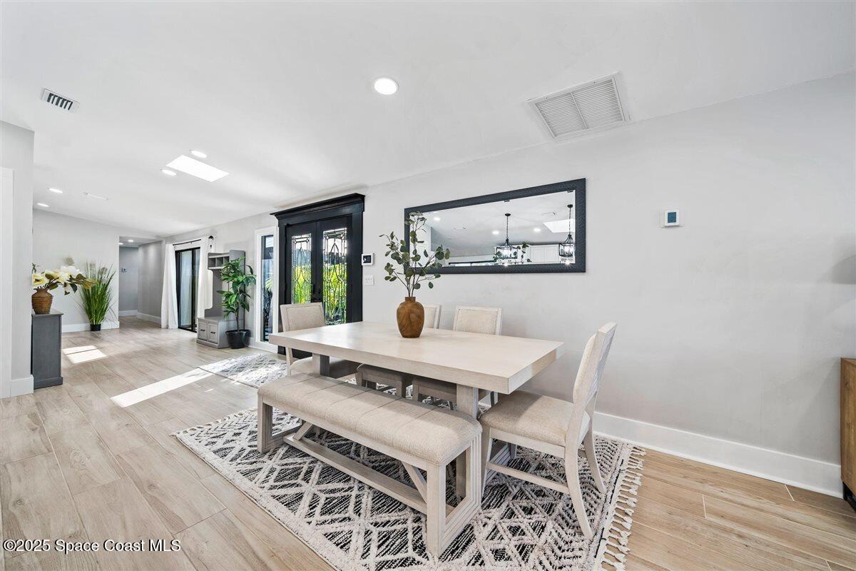 470 Rio Vista Lane Merritt Island, FL 32952 - Photo 18 of 54 a view of a dining room with furniture