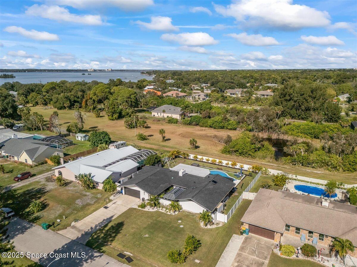 470 Rio Vista Lane Merritt Island, FL 32952 - Photo 45 of 54 an aerial view of residential houses with outdoor space