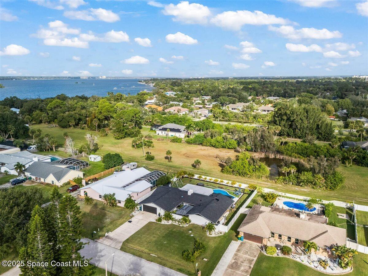 470 Rio Vista Lane Merritt Island, FL 32952 - Photo 47 of 54 an aerial view of residential houses with outdoor space