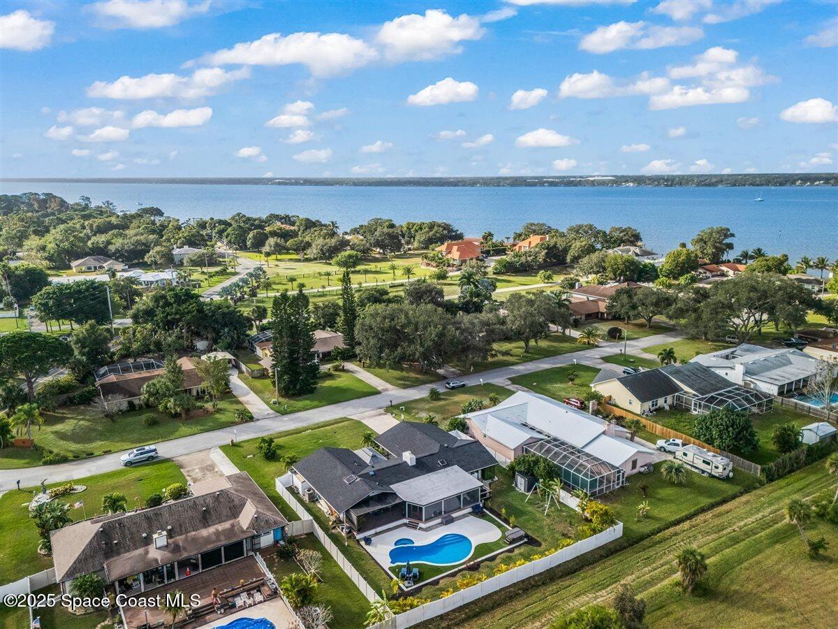 470 Rio Vista Lane Merritt Island, FL 32952 - Photo 49 of 54 an aerial view of residential houses with outdoor space