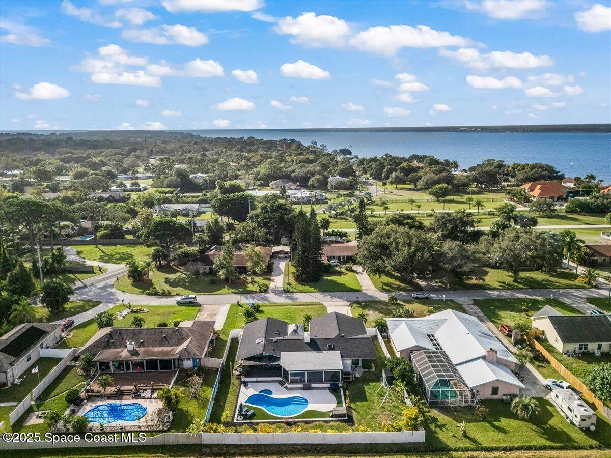 470 Rio Vista Lane Merritt Island, FL 32952 - Photo 50 of 54 an aerial view of residential houses with outdoor space