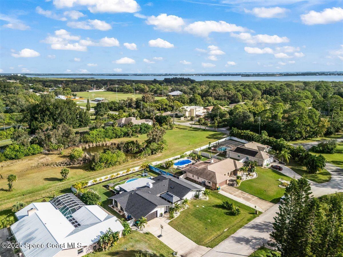 470 Rio Vista Lane Merritt Island, FL 32952 - Photo 51 of 54 an aerial view of residential houses with outdoor space
