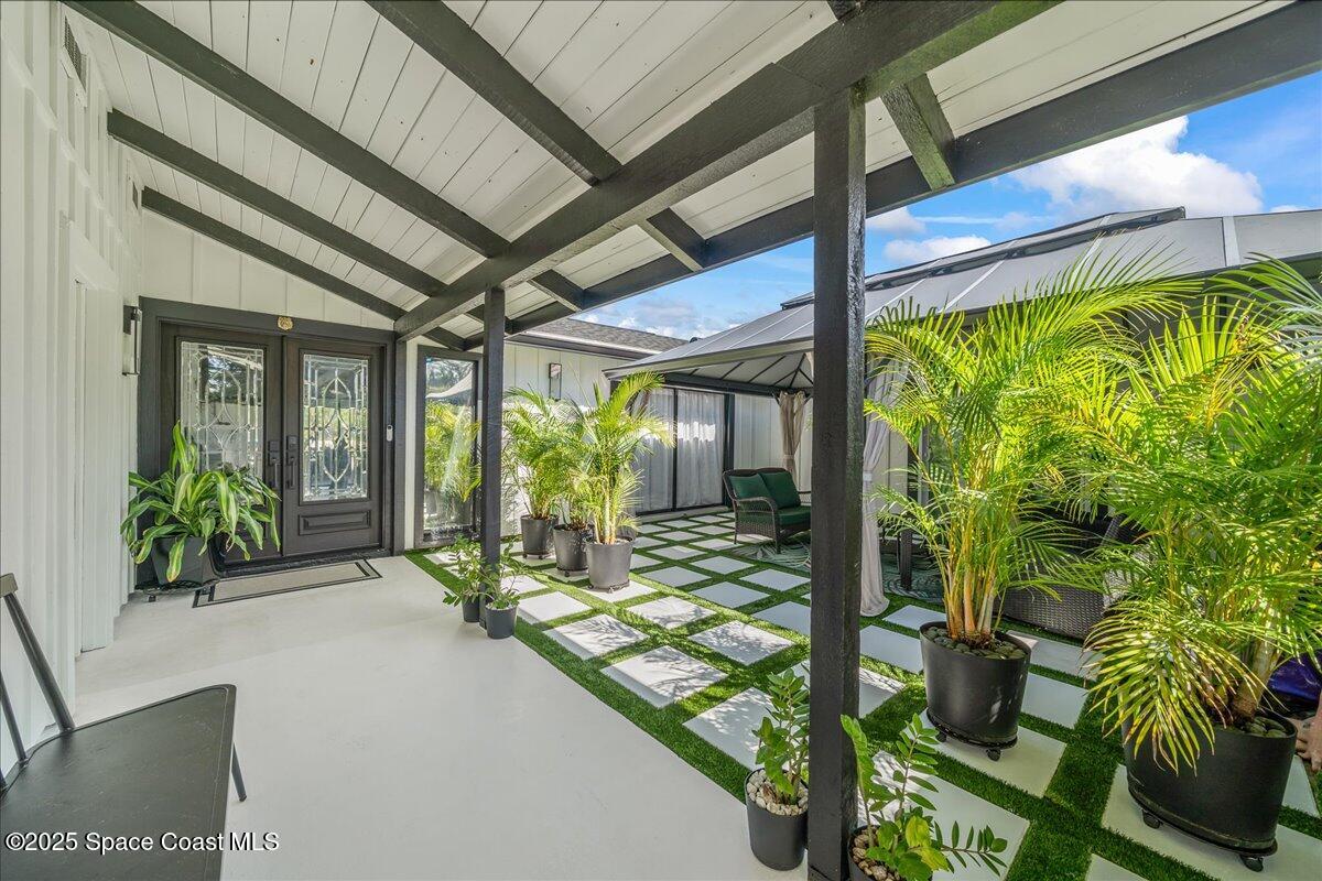 470 Rio Vista Lane Merritt Island, FL 32952 - Photo 6 of 54 a view of a porch with seating space