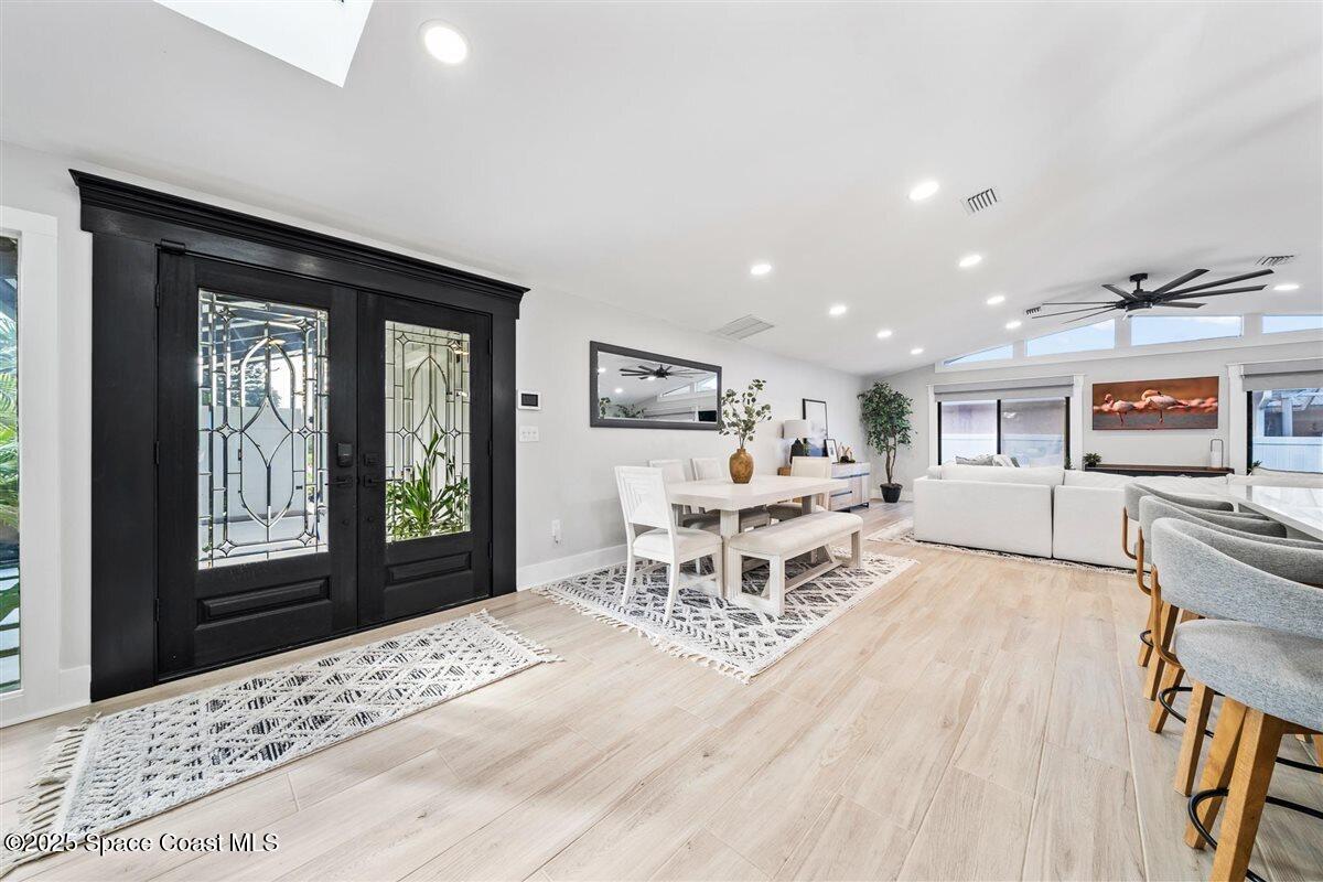 470 Rio Vista Lane Merritt Island, FL 32952 - Photo 10 of 54 a living room with furniture and a table