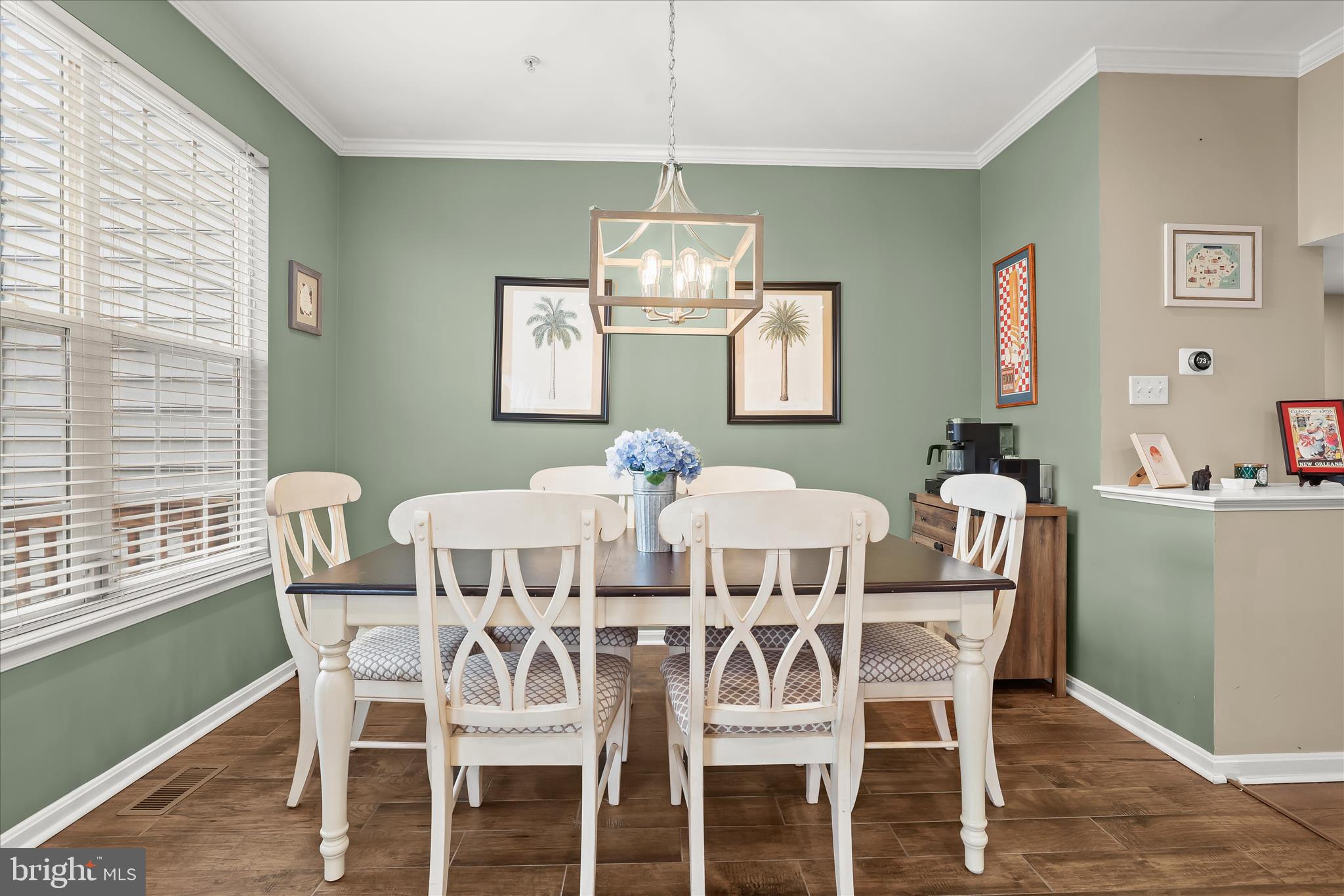 1055 Lily Way Odenton, MD 21113 - Photo 12 of 56 a view of a dining room with furniture window and outside view