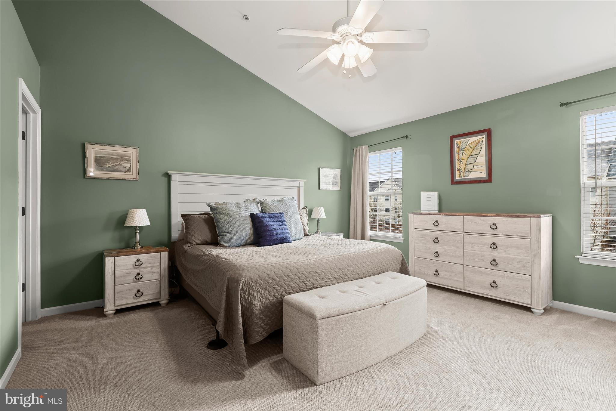 1055 Lily Way Odenton, MD 21113 - Photo 14 of 56 a bedroom with a bed and a chandelier