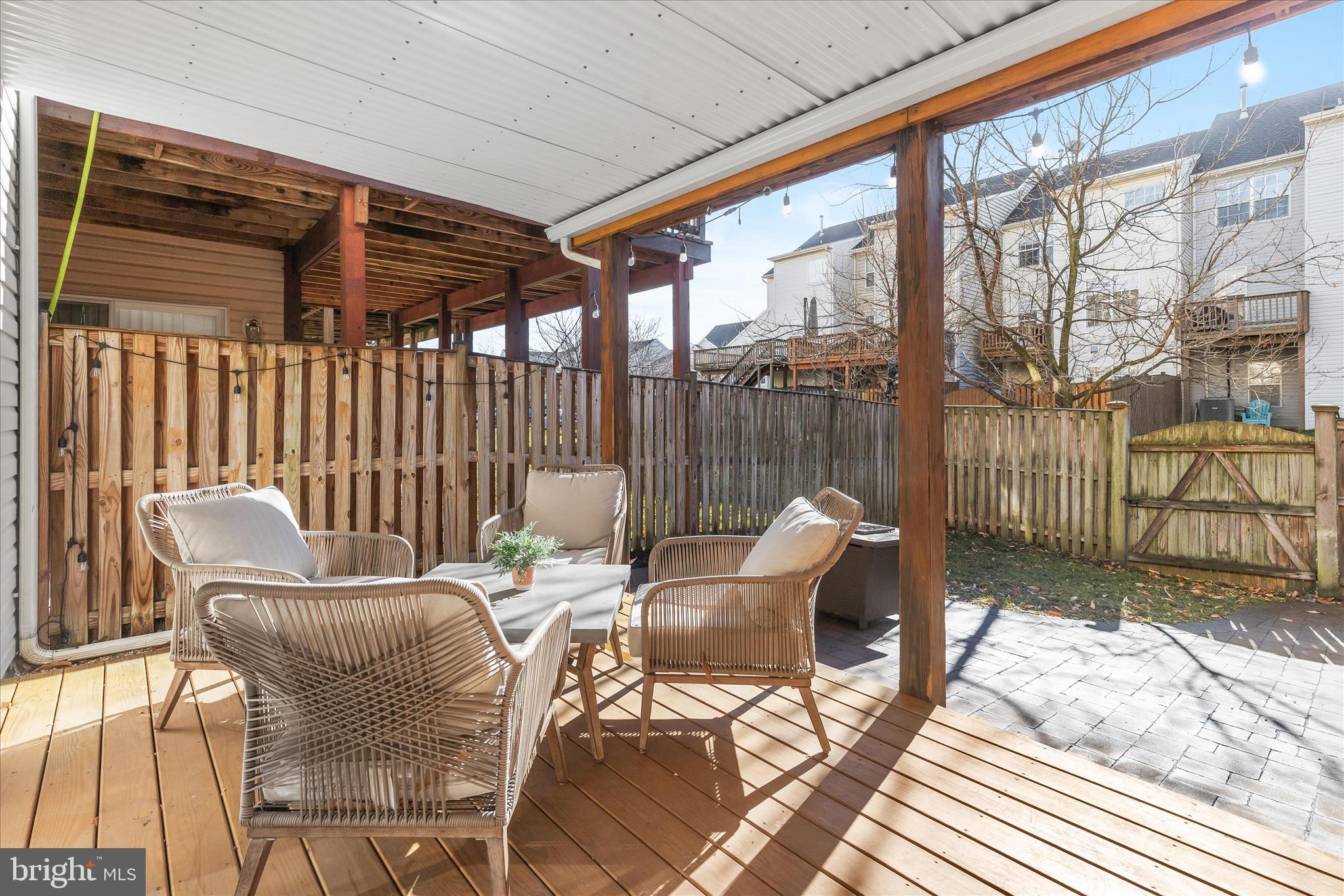 1055 Lily Way Odenton, MD 21113 - Photo 28 of 56 a patio view with a outdoor seating