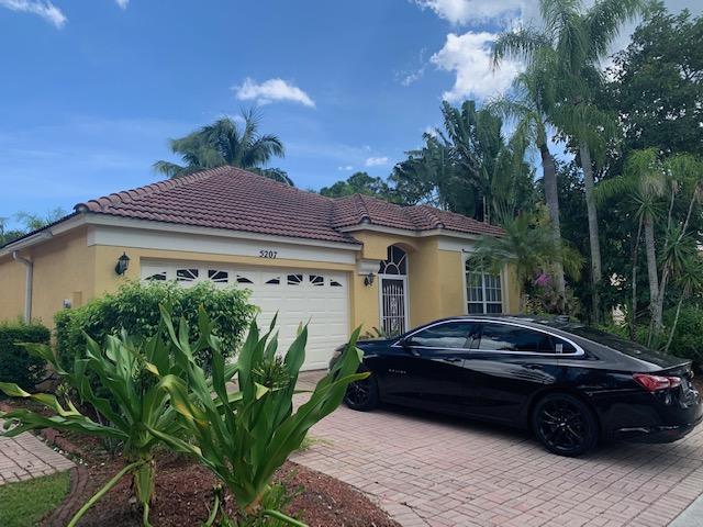 5207 Edenwood Road Riviera Beach, FL 33418 - Photo 1 of 24 IMG_5939