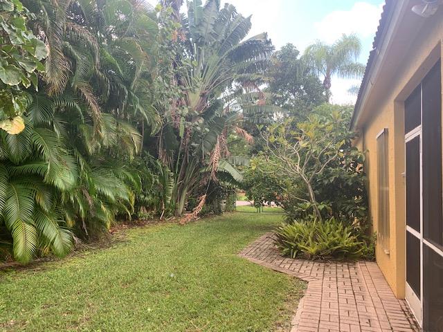 5207 Edenwood Road Riviera Beach, FL 33418 - Photo 4 of 24 side yard
