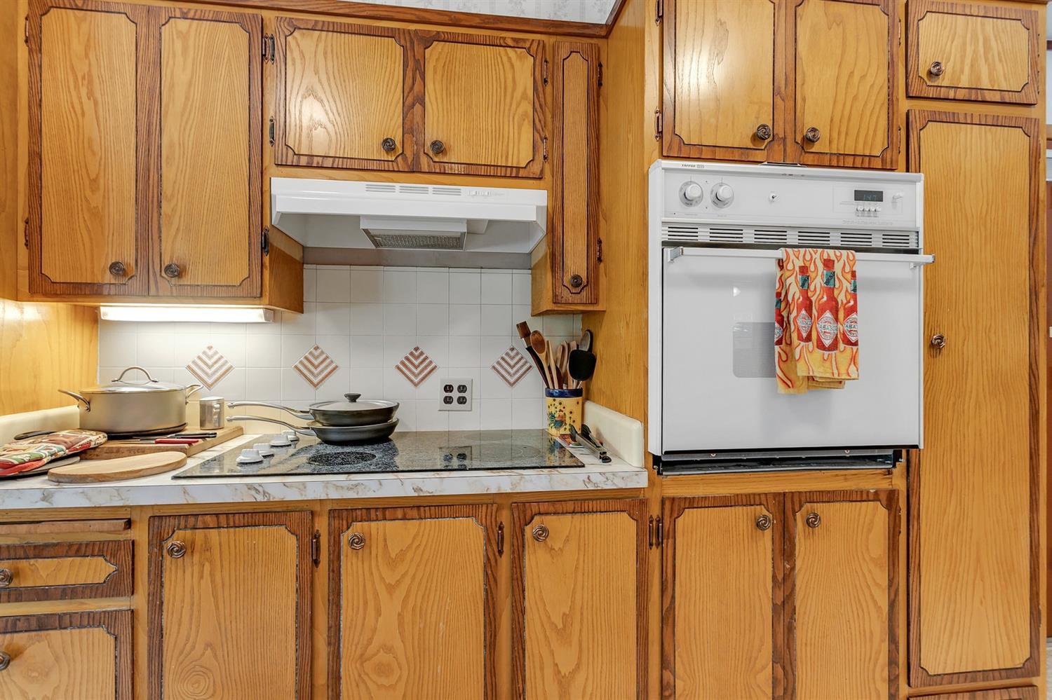 11851 Upper Applegate Road Jacksonville, OR 97530 - Photo 17 of 34 a kitchen with stainless steel appliances granite countertop a refrigerator and a stove top oven