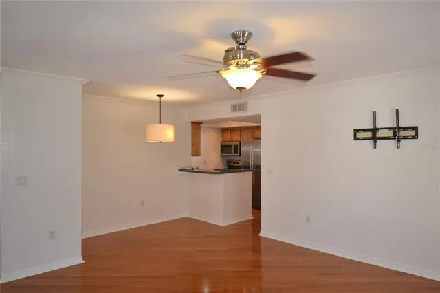 a view of a kitchen from the hallway