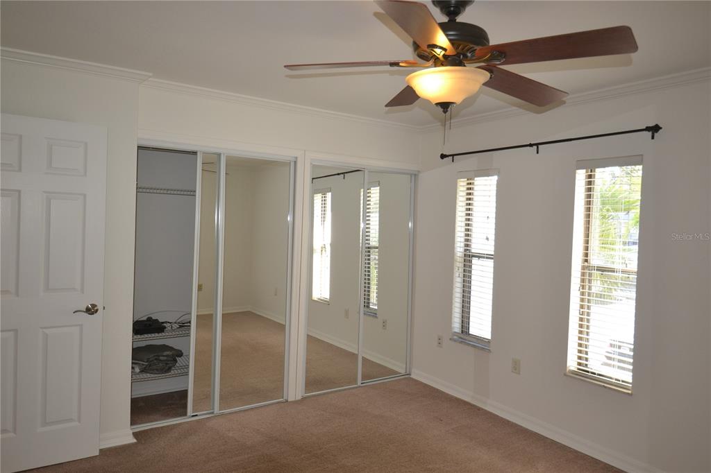 718 Lyndhurst Street, Unit 922 Dunedin, FL 34698 - Photo 27 of 39 a view of an empty room with a window