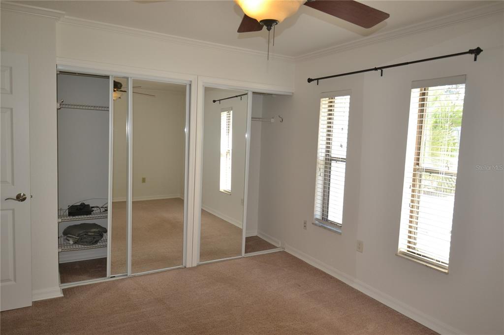 718 Lyndhurst Street, Unit 922 Dunedin, FL 34698 - Photo 28 of 39 a view of livingroom with hardwood floor and a ceiling fan