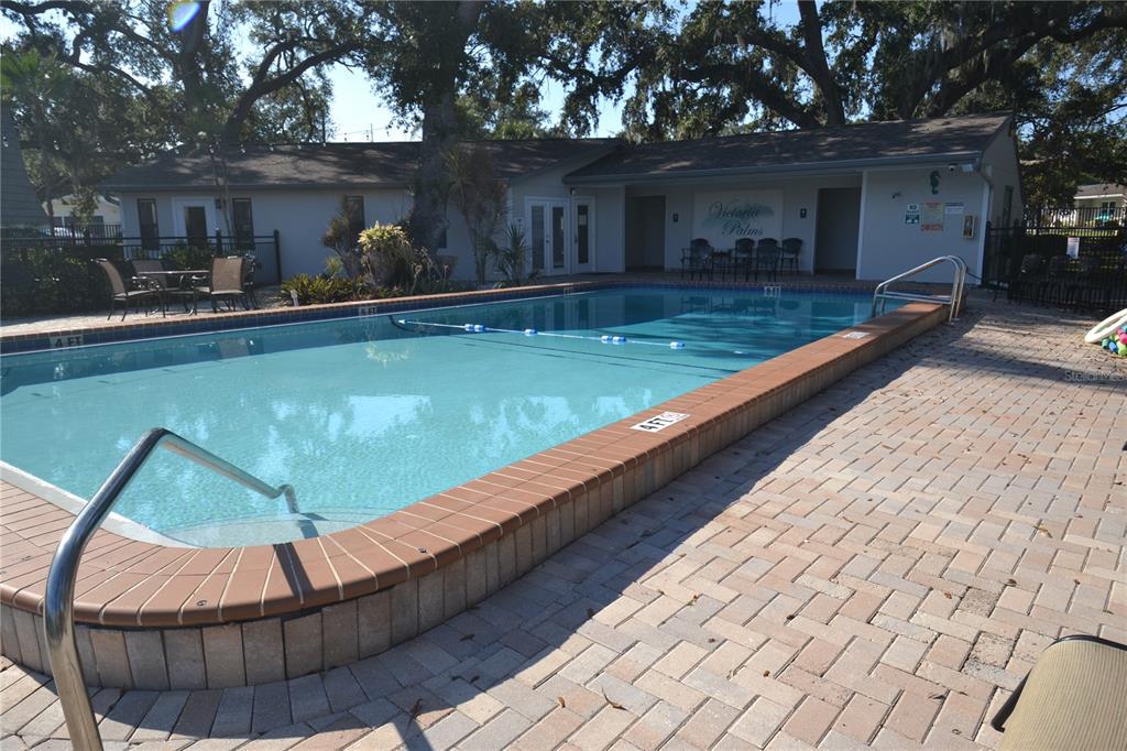 718 Lyndhurst Street, Unit 922 Dunedin, FL 34698 - Photo 33 of 39 a view of swimming pool with a patio