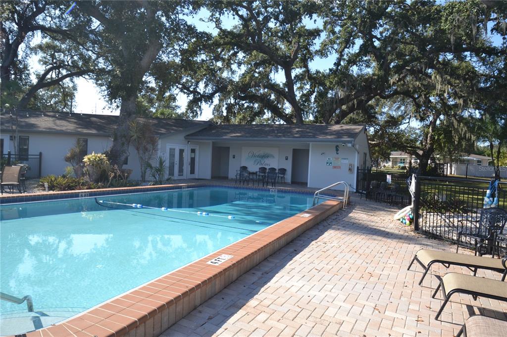 718 Lyndhurst Street, Unit 922 Dunedin, FL 34698 - Photo 36 of 39 a view of a house with pool