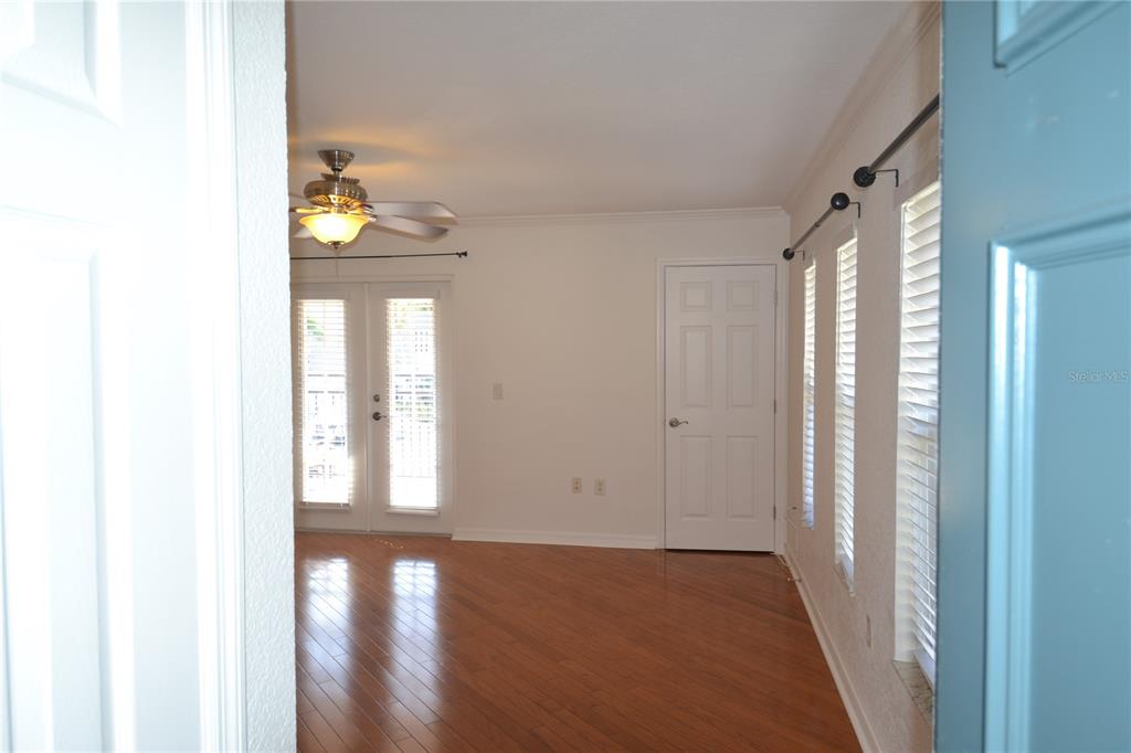 718 Lyndhurst Street, Unit 922 Dunedin, FL 34698 - Photo 10 of 39 a view of livingroom with furniture and wooden floor