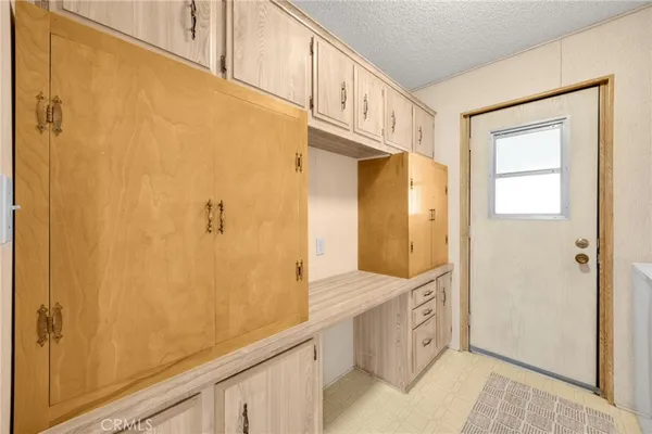 a bathroom with a double vanity sink and mirror