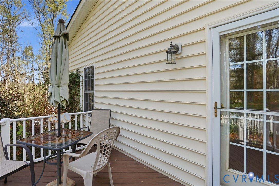 14430 Overlook Ridge Lane Beaverdam, VA 23015 - Photo 56 of 71 a view of house with deck and outdoor seating