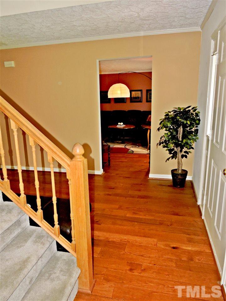 21 Landmark North Roxboro, NC 27574 - Photo 21 of 25 a view of staircase with wooden floor and a rug