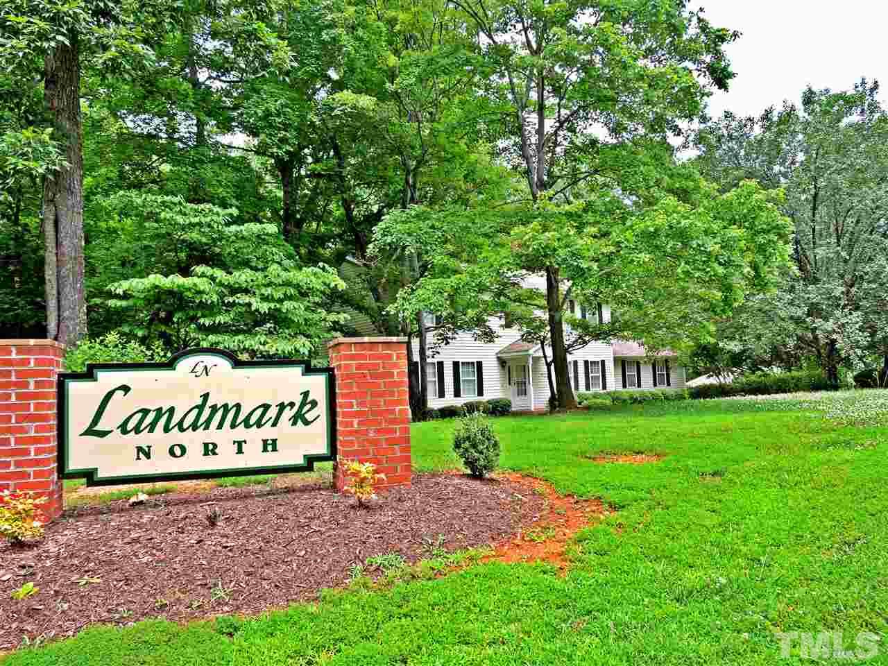 21 Landmark North Roxboro, NC 27574 - Photo 25 of 25 a sign of golf club on a wall under a tree