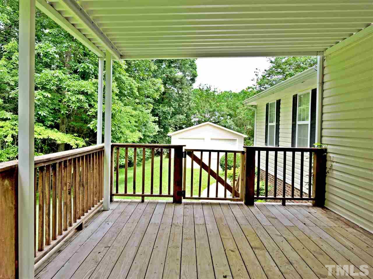 21 Landmark North Roxboro, NC 27574 - Photo 4 of 25 a view of a wooden deck