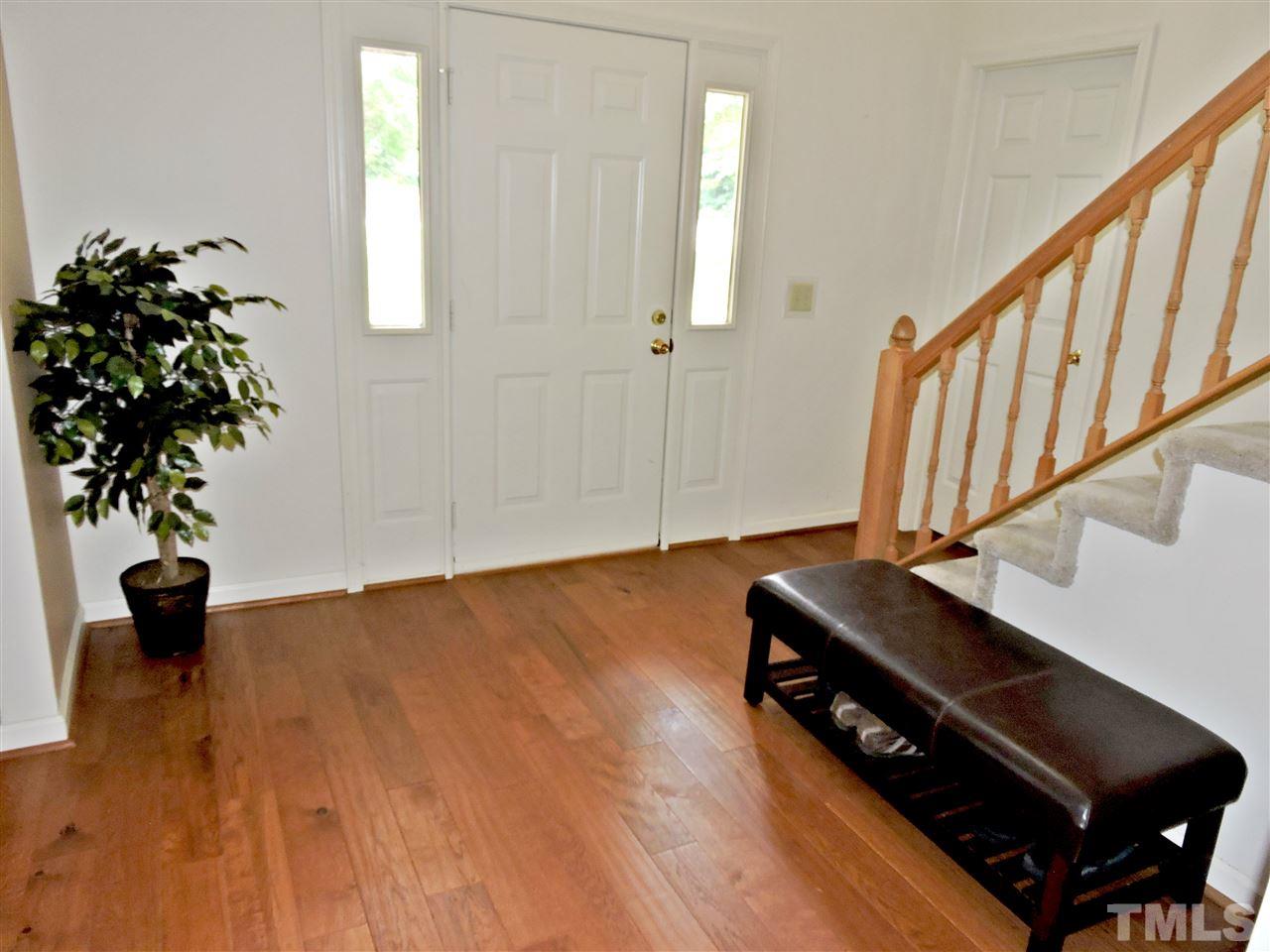 21 Landmark North Roxboro, NC 27574 - Photo 5 of 25 a view of room with window and wooden floor