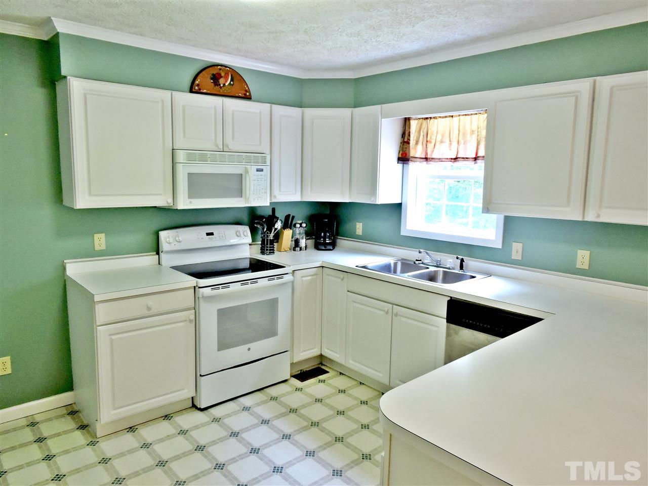 21 Landmark North Roxboro, NC 27574 - Photo 7 of 25 a kitchen with a sink cabinets and window