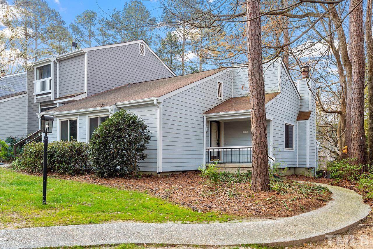 700 Green Ridge Drive Raleigh, NC 27609 - Photo 1 of 33 a view of a house with a yard