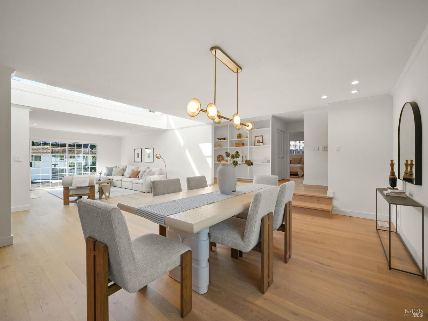 148 Dominican Drive San Rafael, CA 94901 - Photo 11 of 60 a dining room with furniture a chandelier and wooden floor