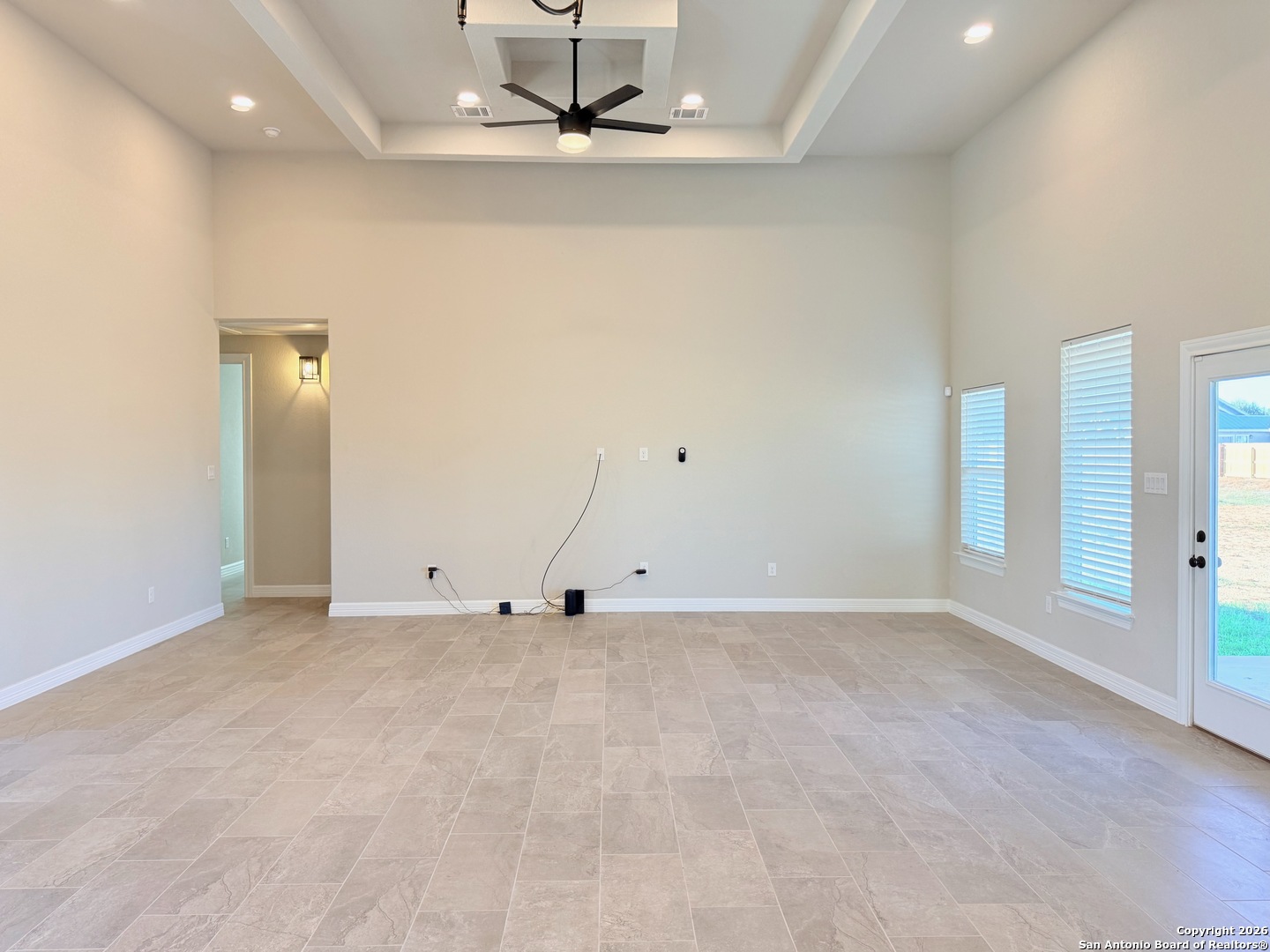1313 Fm 3175 Lytle, TX 78052 - Photo 8 of 45 an empty room with a empty space and windows