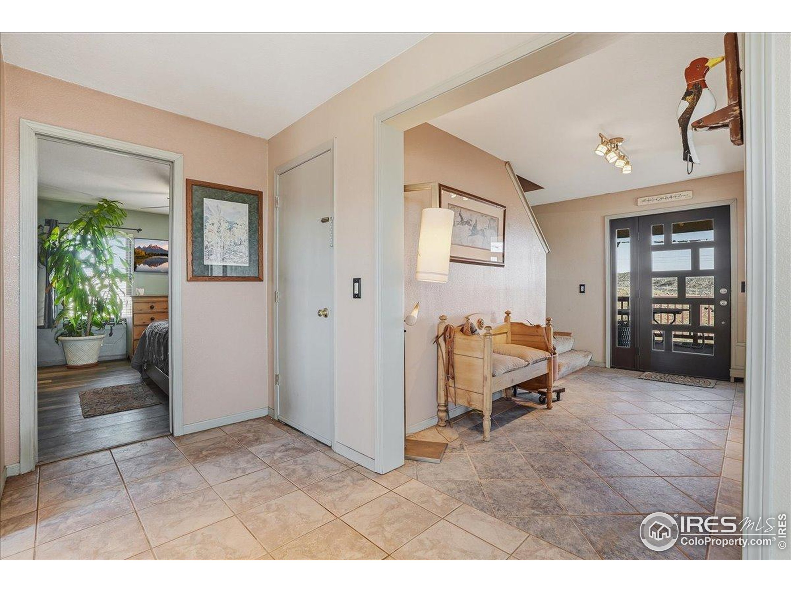 601 Red Mountain Road Livermore, CO 80536 - Photo 7 of 49 a view of a livingroom with furniture and a hallway
