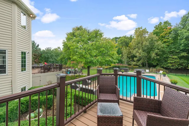 a view of a two chair in the balcony