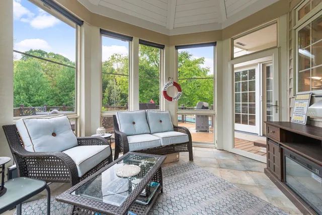 a living room with furniture and a window