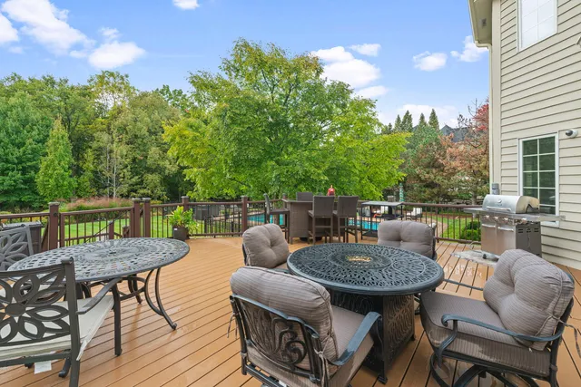 a balcony view with a seating space