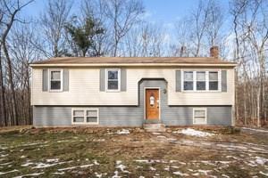 42 Burt Latham Road Willington, CT 06279 - Photo 1 of 1 a front view of a house with a yard