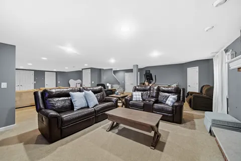 a living room with furniture and a couch