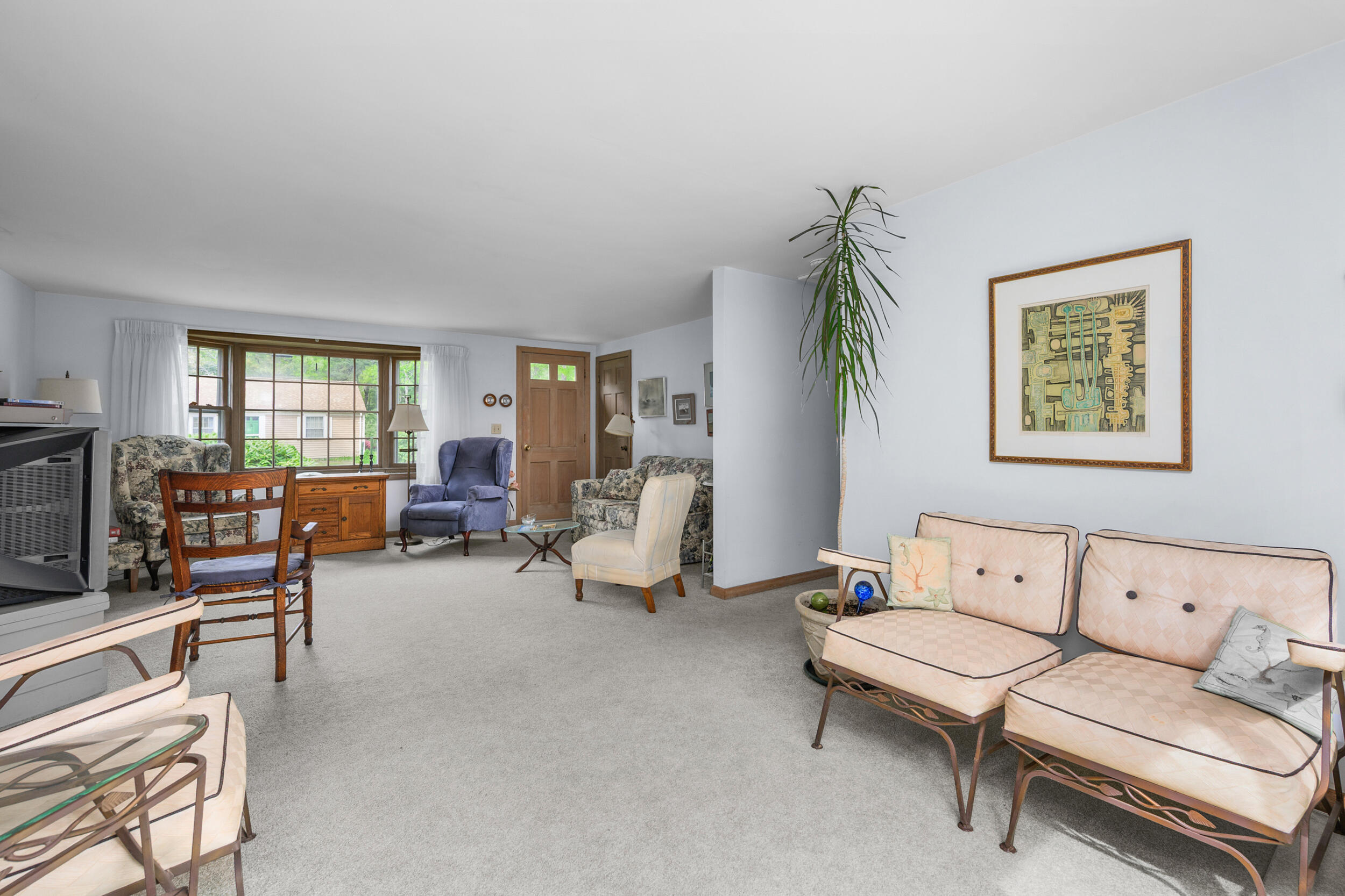 59 Beverly Road West Yarmouth, MA 02673 - Photo 18 of 33 a living room with furniture and a flat screen tv