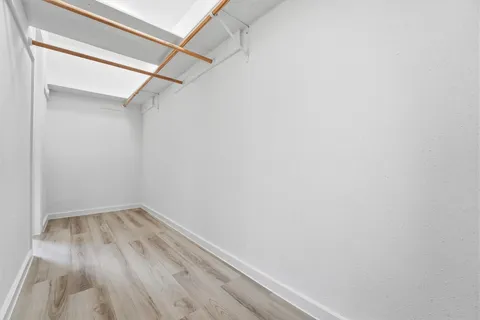 a view of small space with racks on the wall