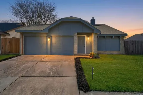 a front view of house with yard
