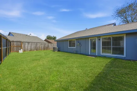 a view of a backyard with a garden