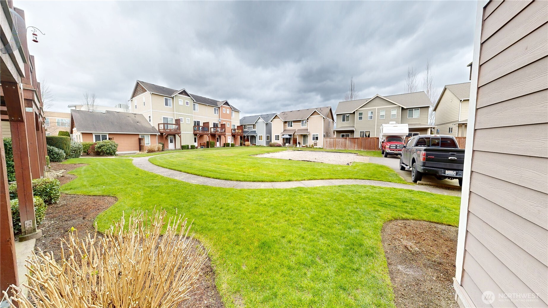 515 Neff Circle Burlington, WA 98233 - Photo 22 of 23 a front view of a house with a yard and garage