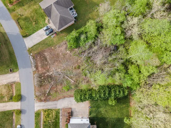 an aerial view of residential house with outdoor space