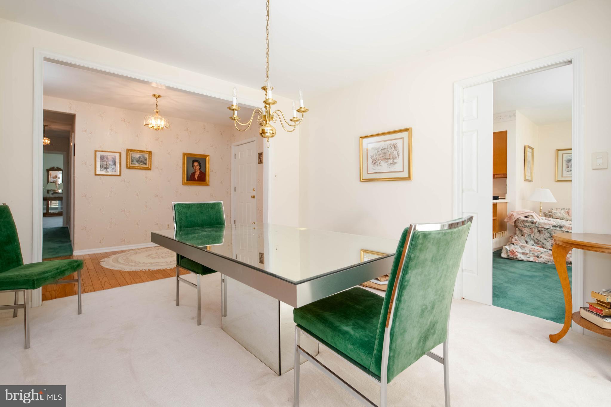 7399 New Cut Road Kingsville, MD 21087 - Photo 16 of 40 a living room with furniture and a chandelier