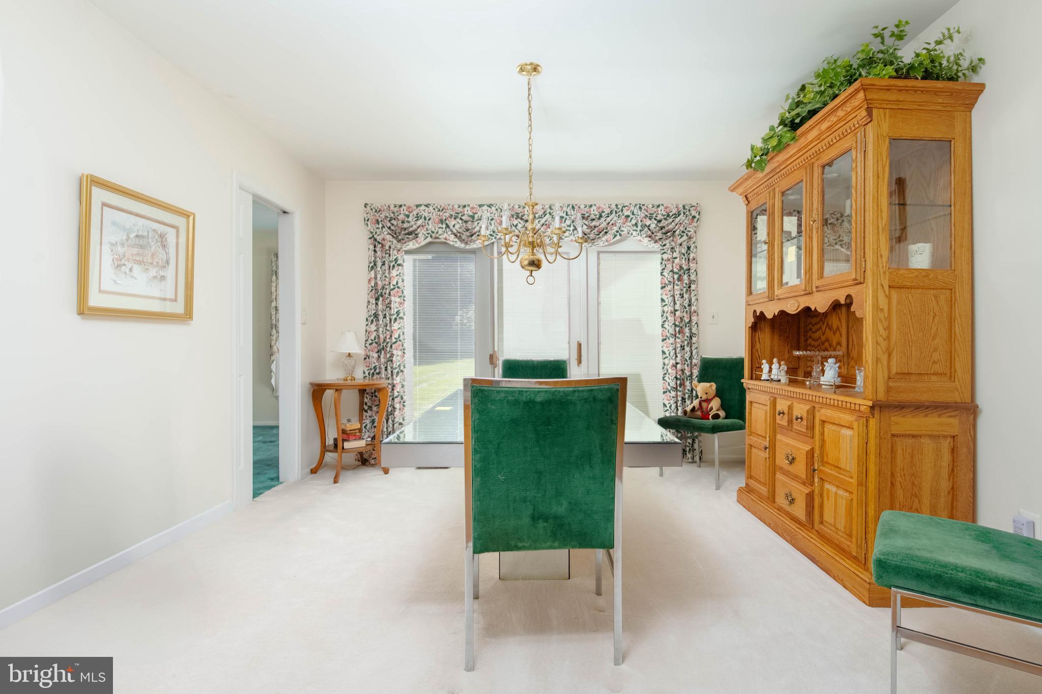 7399 New Cut Road Kingsville, MD 21087 - Photo 17 of 40 a living room with furniture and a chandelier