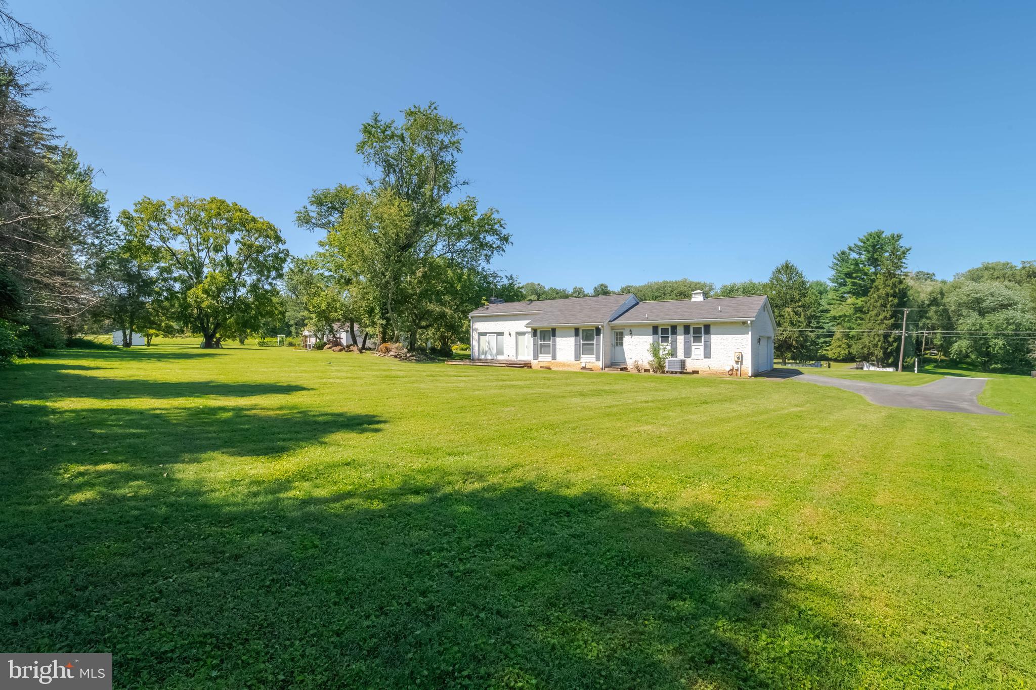 7399 New Cut Road Kingsville, MD 21087 - Photo 39 of 40 a view of a big house with a big yard and large trees
